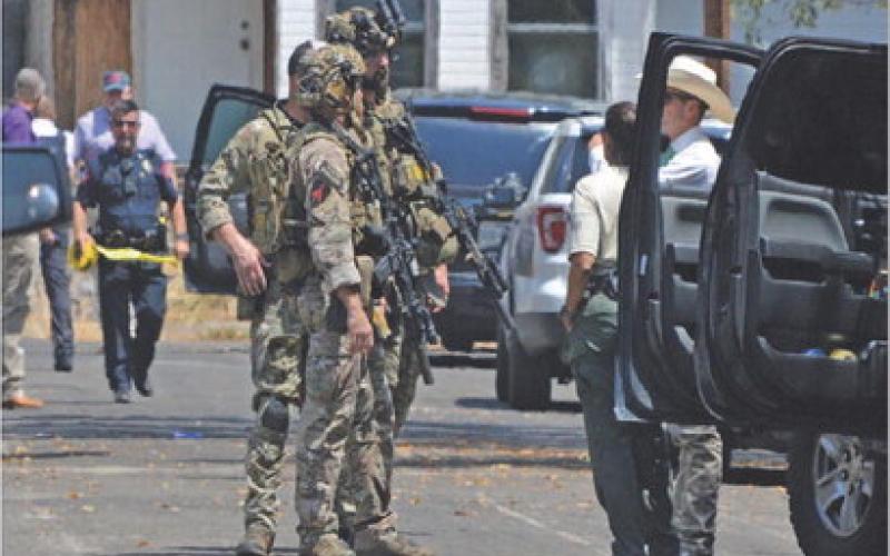 A SWAT team sent by Texas DPS emerged from a Cameron Drive residence Thursday afternoon to confirm that retired Lampasas County sheriff Gordon Morris was deceased from what authorities have stated appears to be a self-inflicted gun shot. ERICK MITCHELL | DISPATCH RECORD