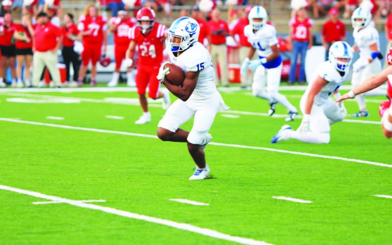 MICHAEL KUEHNE | KDIGITAL PRO Wesley Stephens breaks into the open field for his long touchdown run.
