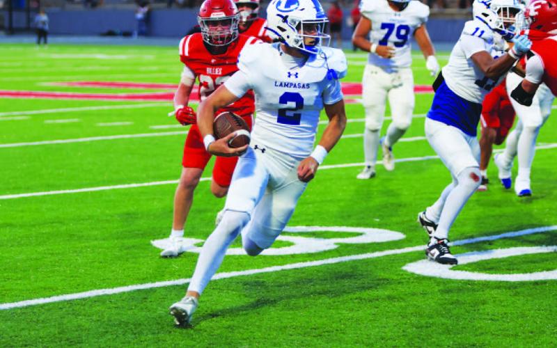 MICHAEL KUEHNE | KDIGITAL PRO Bryson Roberts uses his legs as a weapon for the Badger offense in week one.
