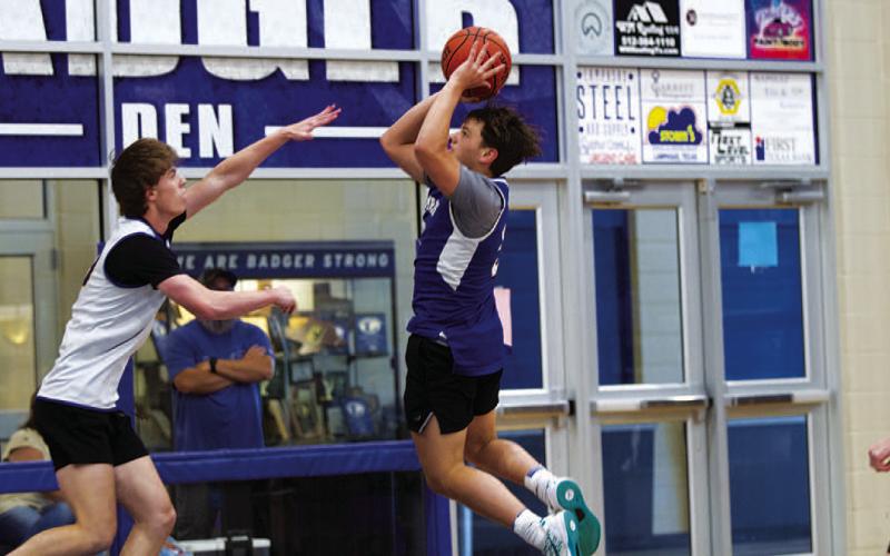 HUNTER KING | DISPATCH RECORD Dylan Polmanteer shoots over the outstrectched hand of a Lago Vista defender.