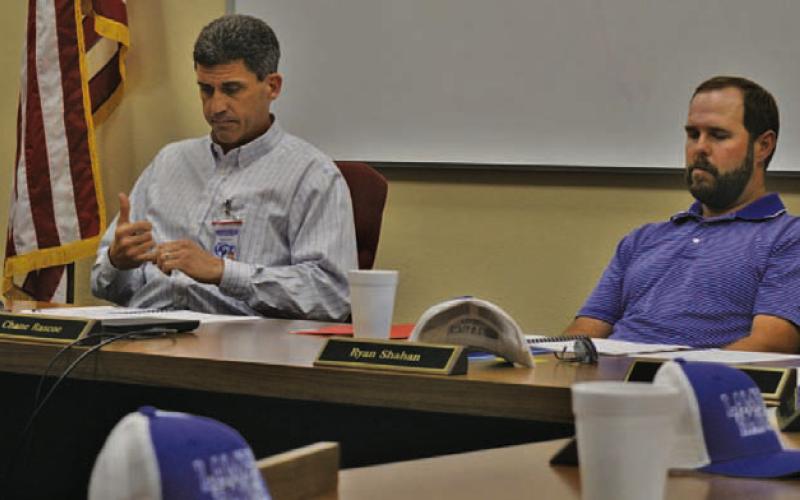 At left, Lampasas ISD Superintendent Dr. Chane Rascoe and Board of Trustees President Ryan Shahan reflect on 2025-26 FY budget figures during last week’s special called meeting. ERICK MITCHELL | DISPATCH RECORD