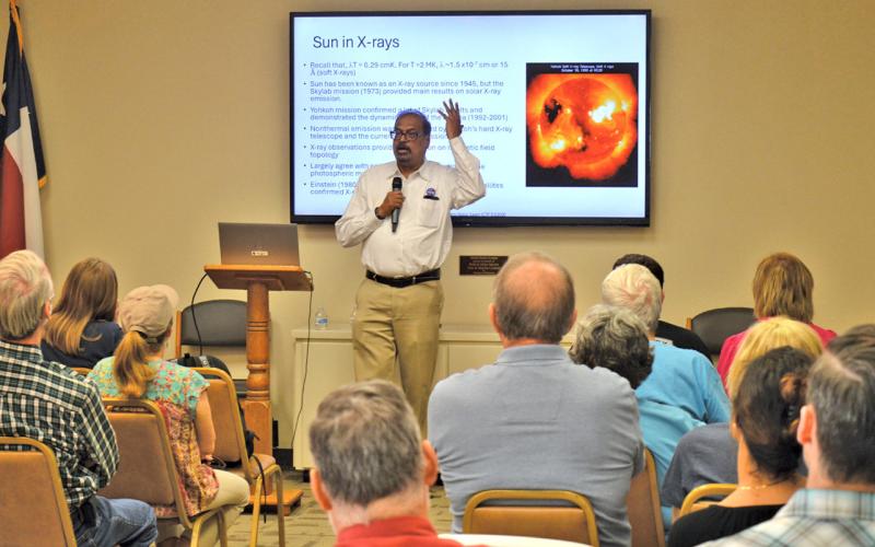 Dr. Nat Gopalswamy addresses an audience at the Lampasas Public Library. The NASA scientist also was at the 580 Sports Complex Monday to study features of the sun during the eclipse. erick mitchell | Lampasas Dispatch Record