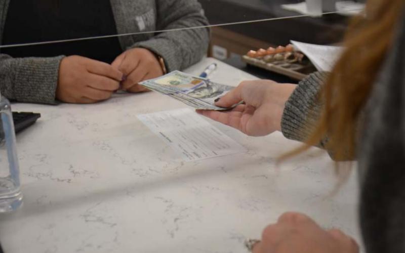A proposed bill before Congress seeks to have banks inform the Internal Revenue Service of customer accounts with total annual deposits or withdrawals of $600 or more. Local and state banking officials have expressed opposition to the proposal. MONIQUE BRAND | DISPATCH RECORD