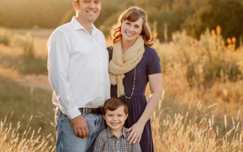 Andrew and Stephany Strouth are pictured with their adopted son, Kaysen. COURTESY PHOTO