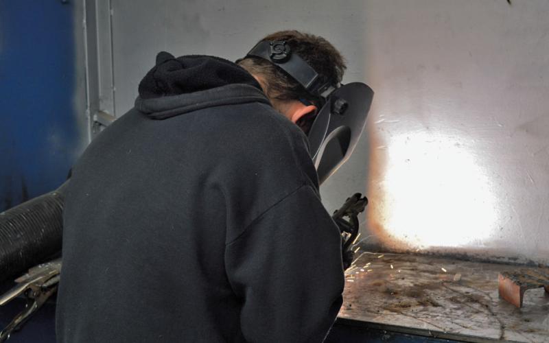 erick mitchell | dispatch record Jace Winger works on his T-joint weld during the class competition.