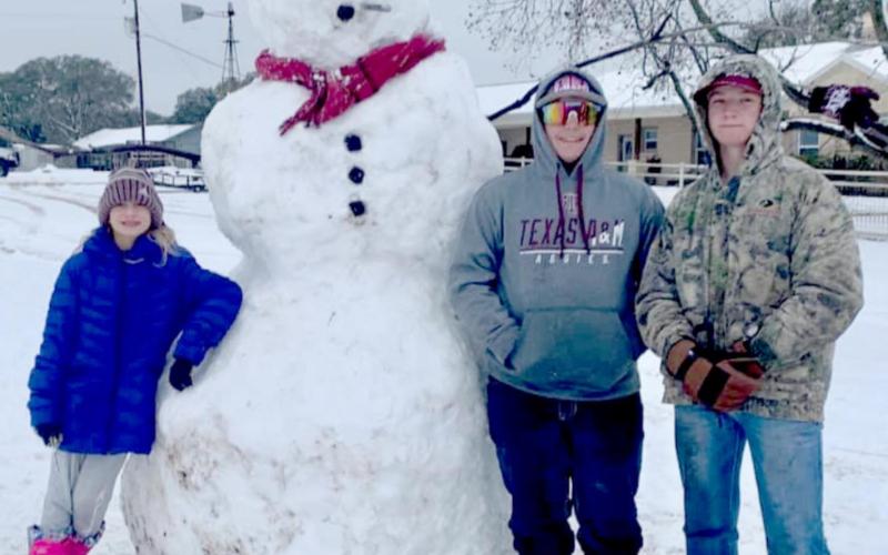 Many residents spent time outdoors enjoying the snow that covered Lampasas County last January. This family created a giant snowman with the frozen precipitation. When the snow and ice returned in February, however, the bitter cold conditions were much harder to endure. KIM LANGFORD | COURTESY PHOTO