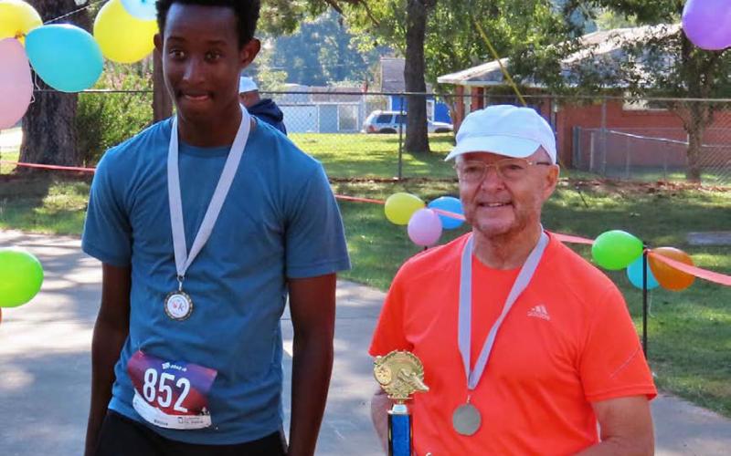 COURTESY PHOTO | KAYE MCDANIEL Steve McDaniel, bib #849, ran the Cypress Bend Elementary School 5K in Jefferson. He was third in the male over 15 years old age group. The other two winners in this age group were 16 and 17 years old.
