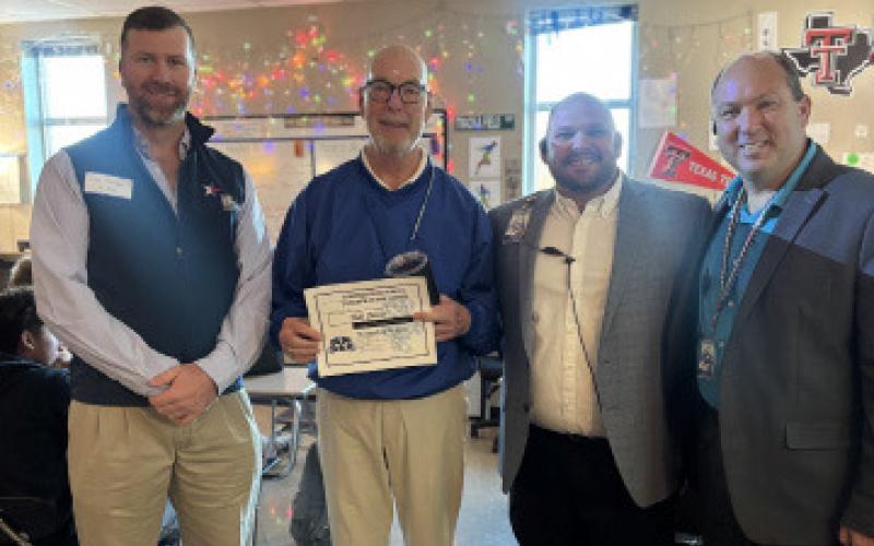 For the month of November, Lampasas High School celebrated its Teacher of the Month Bob Davis, second from left. On hand to honor Davis is Clay Phillips, left, of Texas Farm Bureau Insurance; Assistant Principal Ryan Race and Principal Paul Weinheimer. Race said Davis “is an exceptional old-school English teacher who reaches all students with his kindness and his consistency.” COURTESY PHOTO