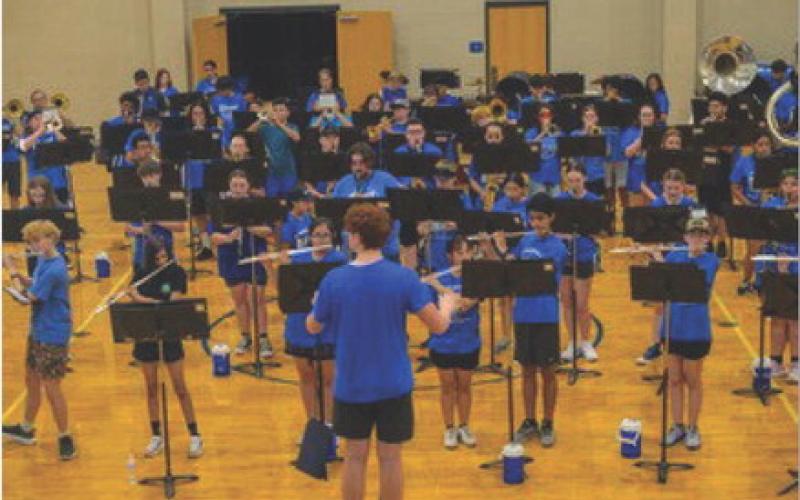 Band students practice indoors during summer camp in preparation for the marching season this fall. courtesy photo | rachel k gill photography