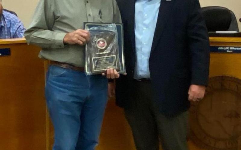 Kempner Municipal Judge and former mayor Gene Isenhour, left, stands with current Kempner Mayor John Wilkerson and honored with the city’s inaugural Impression Award. CITY OF KEMPNER FACEBOOK PAGE