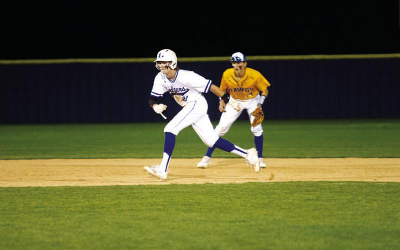 Timber Gholson gets a secondary lead after hitting a double in the first inning. HUNTER KING | DISPATCH RECORD