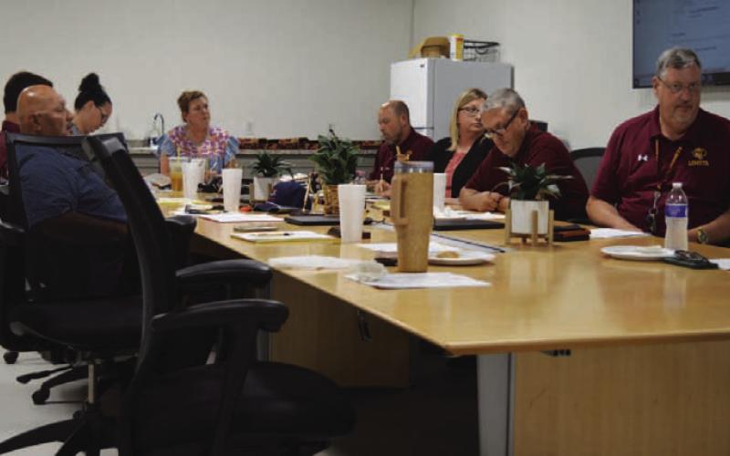 The Lometa school board listens to a presentation about the district’s afterschool program, which may be discontinued next year due to decreased grant funding available from the Central Texas Council of Governments. ERICK MITCHELL | DISPATCH RECORD