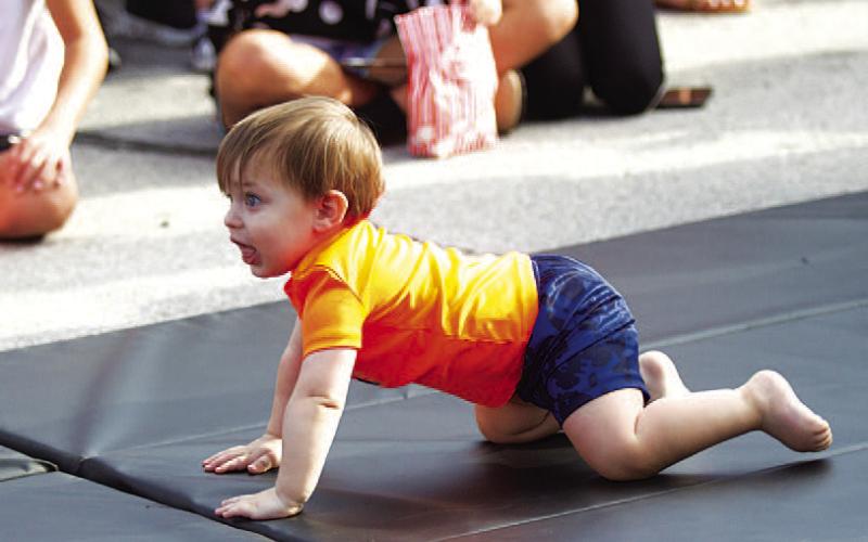 Nash Ingram participates in a previous Diaper Derby. FILE PHOTO