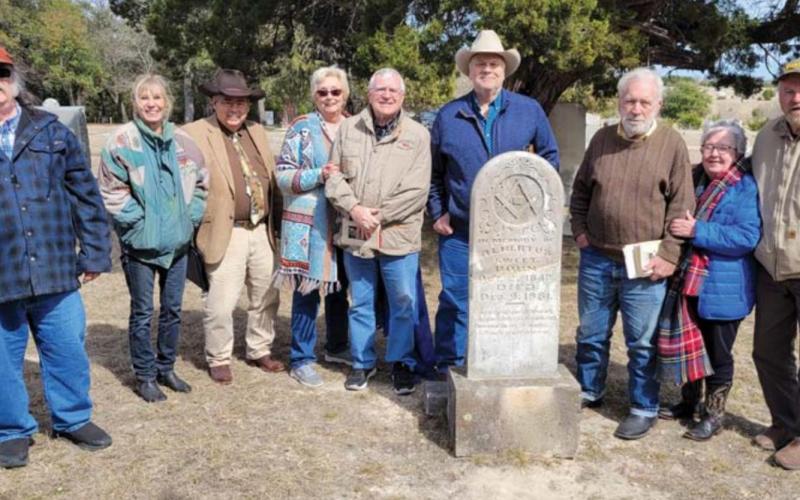 Refurbished tombstone rededicated