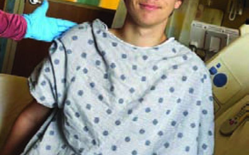 Hunter Sappenfield, pictured Wednesday, was able to sit himself up. Doctors believe he could regain some lower body function. COURTESY PHOTO