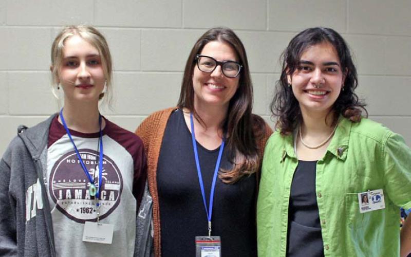 veronica butler| dispatch record Sophomore Daphne Davenport, left, and senior Tate Brown, right, stand with art teacher Judith Brown before the state competition. Color photos of their art can be viewed at the Dispatch Record website and in the online edition.