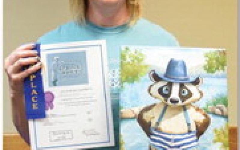 Rachel Gill won adult champion in digital media with “Badger in the springs.” ALEXANDRIA RANDOLPH | DISPATCH RECORD