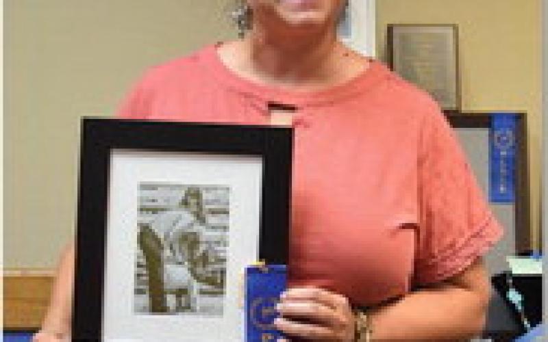 Teresa Greenberg won adult champion in the photography category for “People with goat.” ALEXANDRIA RANDOLPH | DISPATCH RECORD