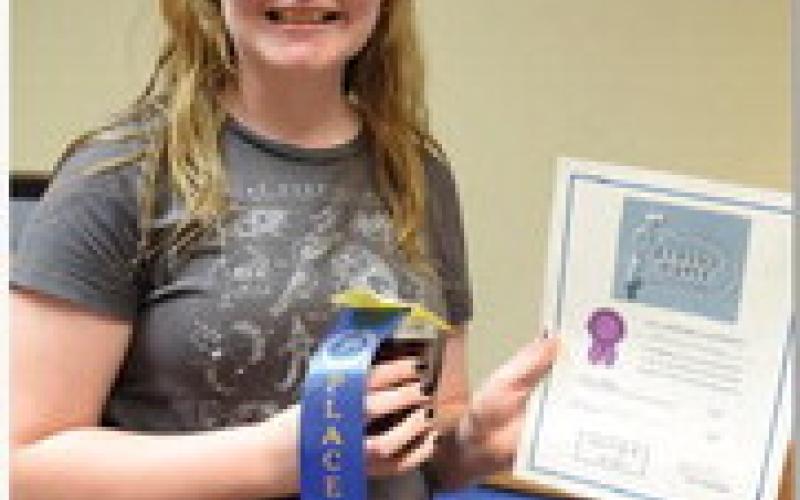 Audrey Wallace won junior champion for canned goods with her strawberry jam. ALEXANDRIA RANDOLPH | DISPATCH RECORD