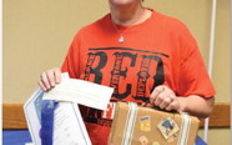 Ellen Schriver won adult champion of the theme category with her Spring Home suitcase. ALEXANDRIA RANDOLPH | DISPATCH RECORD