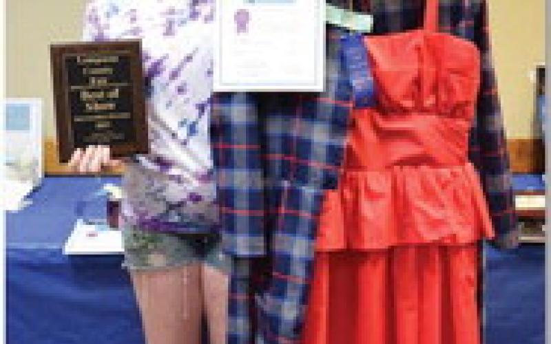 Katelyn Martin won intermediate champion of textiles with a wool coat and red dress. ALEXANDRIA RANDOLPH | DISPATCH RECORD