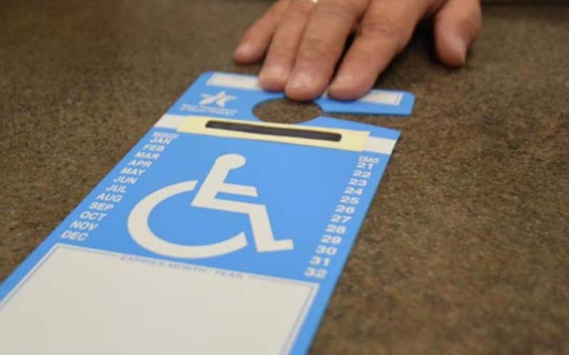 Those who have a disabled veteran license tag with the ISA symbol are eligible to use parking spaces reserved for persons with disabilities. monique brand | dispatch record