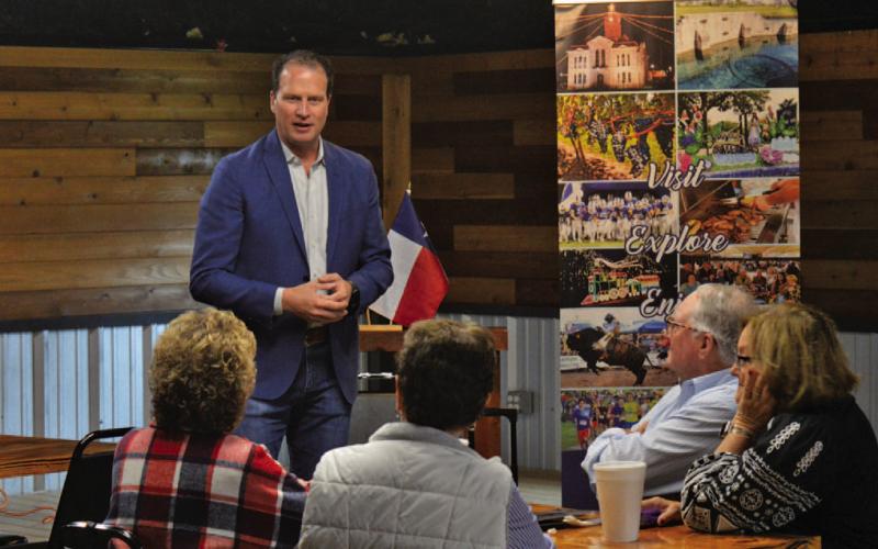 U.S. Rep. August Pfluger speaks to constituents Friday at Putters &amp;amp; Gutters to provide an update on his Washington, D.C. legislative activities. ERICK MITCHELL | DISPATCH RECOARD