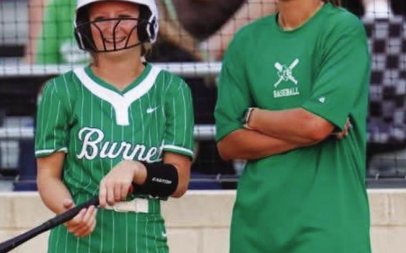 Ali Tippie talks with one of her Burnet softball players. COURTESY PHOTO
