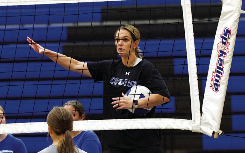 HUNTER KING | DISPATCH RECORD Tippie talks to her players about a drill during her second official practice in charge.