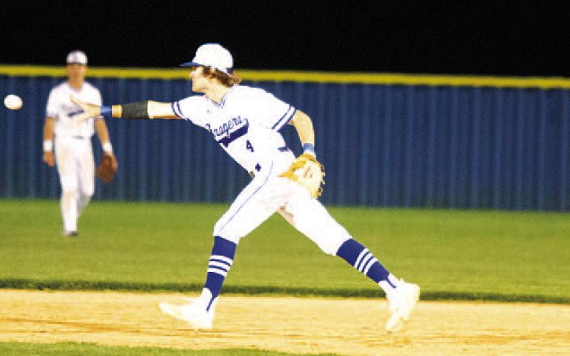 Timber Gholson flips the ball to second for an out. The junior has started nearly every game at second base this season. HUNTER KING | DISPATCH RECORD