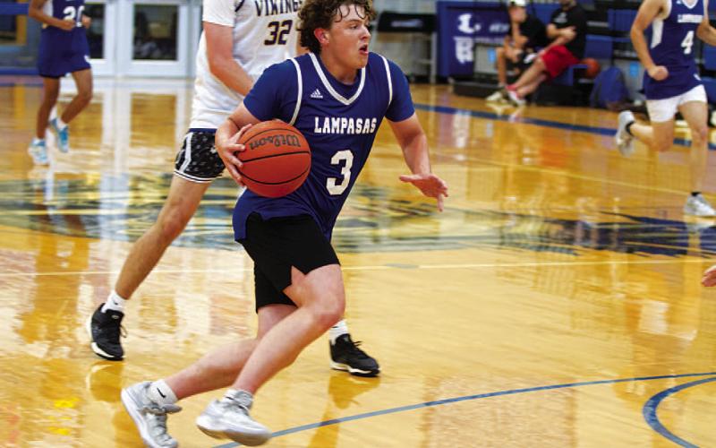 HUNTER KING | DISPATCH RECORD Aidan Nuckles competed all summer, and he has become a leader for the Badgers on the court.