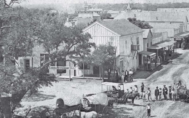 Jerry Scott’s Lampasas Saloon, later the Gem saloon, was located near the north end of the west side of the courthouse square. The “Dead Man’s Saloon” was destroyed by a fire in 1884. The buiding was located behind the tree in this photo. COURTESY PHOTO | lampasas county museum