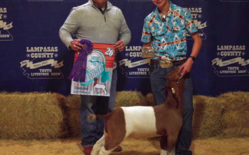 Taking grand champion honors for market goats was Hadley Kuhl. ERICK MITCHELL | DISPATCH RECORD