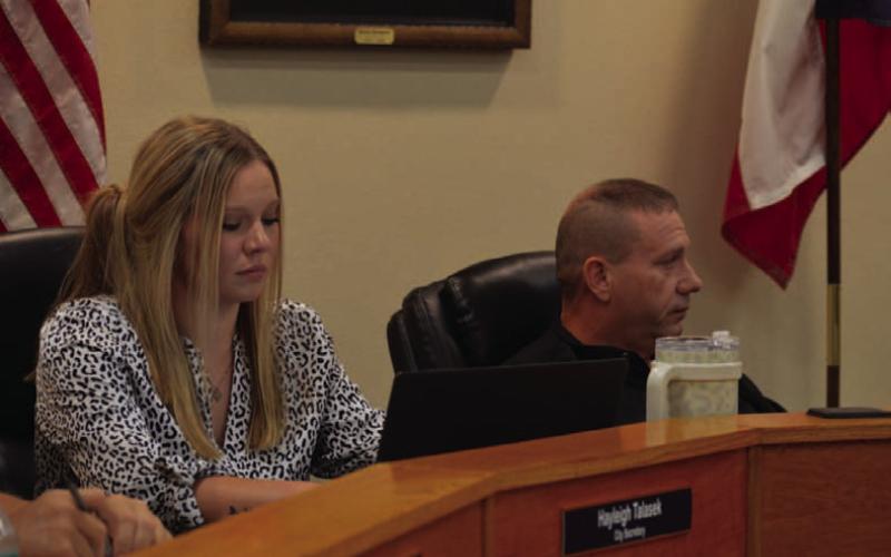City Secretary Hayleigh Talasek, shown sitting next to Mayor John Wilkerson, has tendered her resignation to Kempner officials, however she plans to provide training when a replacement is hired and will be available on a contract basis after January 2026 to assist the city if needed. ERICK MITCHELL | DISPATCH RECORD