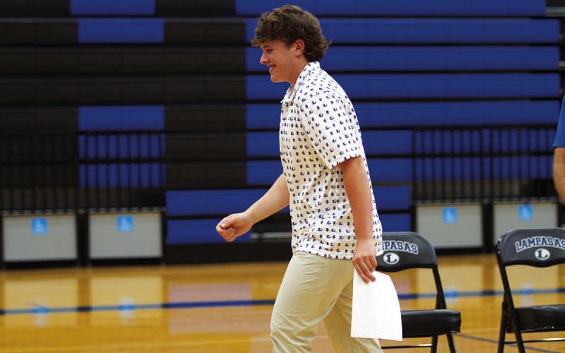 Aidan Nuckles smiles after being announced the winner of the Battlin’ Badger award. HUNTER KING | DISPATCH RECORD