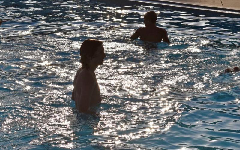 Teens take the chance to relax at the pool during the Teen Scene event. JOSEPH NEUENSCHWANDER | LAMPASAS DISPATCH RECORD