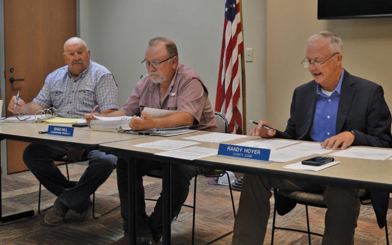 Lampasas County Commissioners Court convened in the conference room at the county annex on Monday, as rehabilitation work continues in the courthouse. Pictured are, from left, Commissioner Mark Rainwater, Commissioner Shad Hill and County Judge Randy Hoyer. erick Mitchell | dispatch record