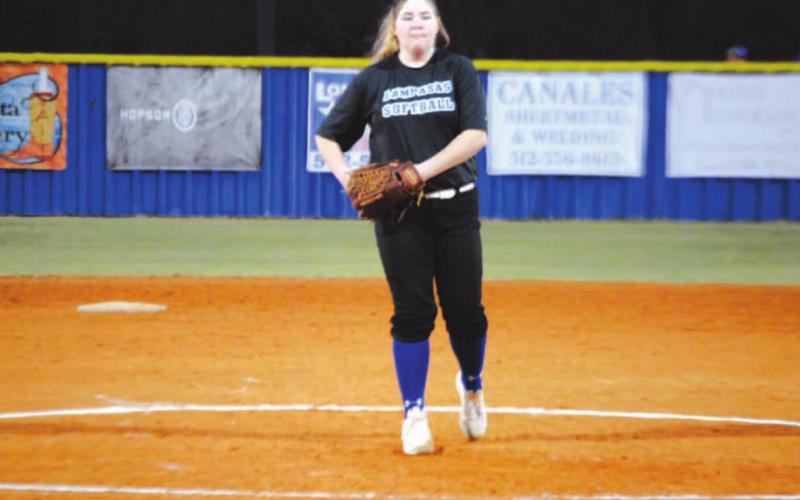 Caitlyn Sanguinet starts to throw a pitch in the first inning of the scrimmage against Waco University. HUNTER KING | DISPATCH RECORD