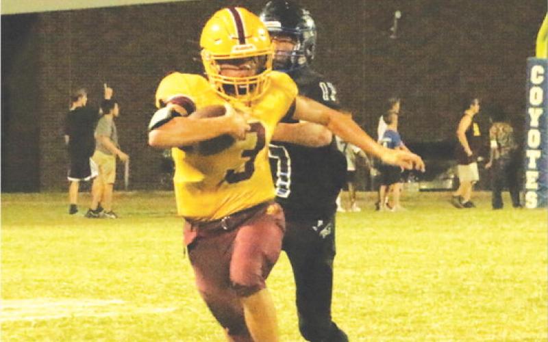 MEGAN LUSTY | COURTESY PHOTO Jordan Livesay runs the ball during Lometa’s loss on Thursday.