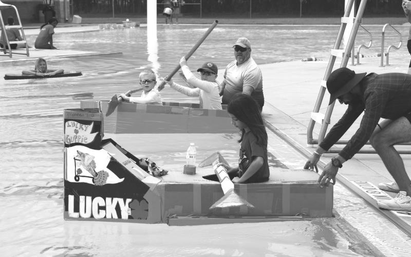 Trent Brown, Cullen Brown and Preely Tiscareno are ready for the regatta to begin. Joycesarah McCabe | Dispatch Record