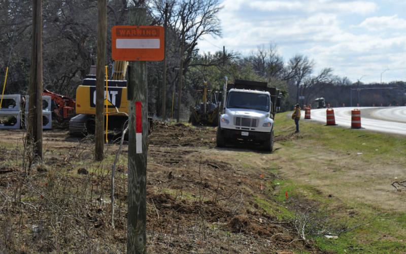 ERICK MITCHELL | DISPATCH RECORD Contract workers have begun a drainage project for the Texas Department of Transportation along South U.S. Highway 281. This initial work is part of an extended TxDOT project designed to improve safety and mobility along the highway from the Burnet County line through the area where the Hostess House sits.