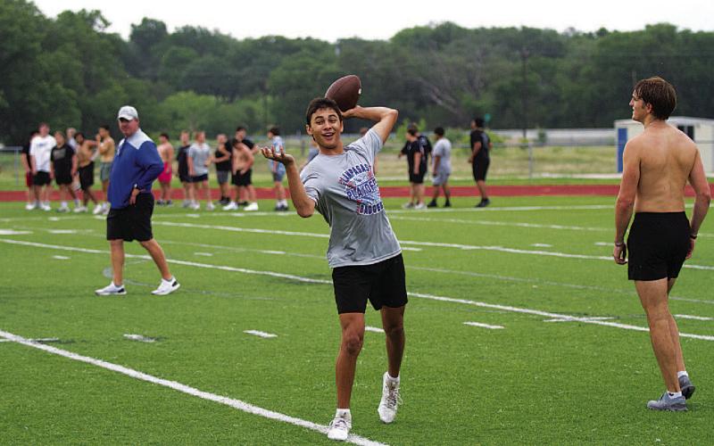 FILE PHOTO Tripp Stinnett participates in sport-specific work after a SWAT workout last year.