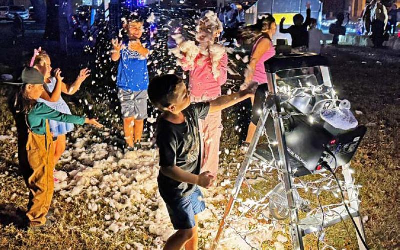 With a white Christmas unlikely, children took advantage of their time in the snow during Saturday’s event. ADAM BARRIOS | DISPATCH RECORD