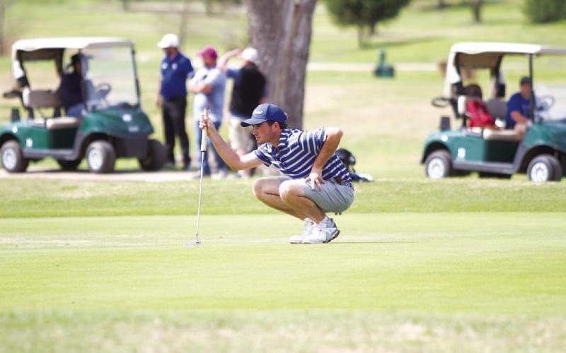 FILE PHOTO Peyton Spore will look to build on his district championship season at the state tournament this month.