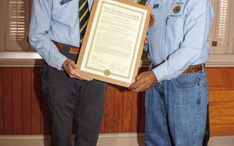 Post Adjutant John Fingerhut, left, and Post Chaplain Harry Hollister display the charter that officially recognizes the renaming of the Briggs Wright Post No. 277. MARTIN RODRIGUEZ | COURTESY PHOTO