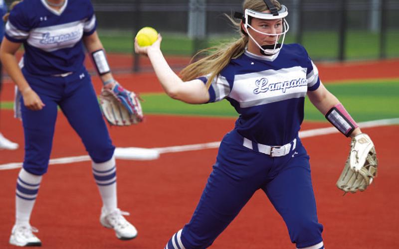 HUNTER KING | DISPATCH RECORD Kamryn Kothmann throws across the diamond for an out against Jarrell Tuesday.