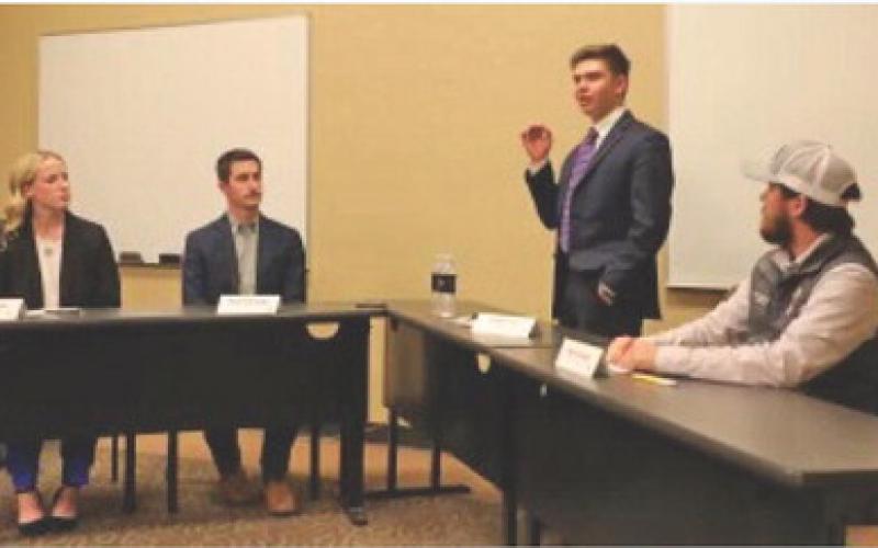 Dawson Raub, a member of the Lampasas County Farm Bureau, makes his final points at a Texas Farm Bureau Collegiate Ag Discussion competition heat held recently in Waco. courtesy photo
