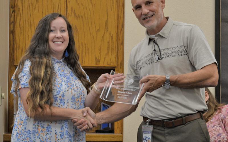 Magan Vann was named Kline Whitis Elementary School’s teacher of the year and Lampasas ISD’s elementary school teacher of the year. She will represent the district at the regional level. Holcomb presented her a plaque of recognition for the honor. ERICK MITCHELL | DISPATCH RECORD