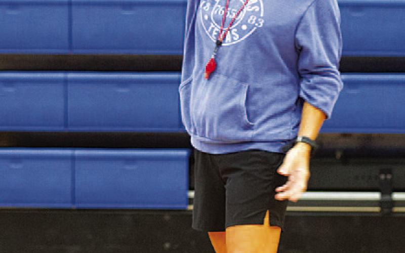 HUNTER KING | DISPATCH RECORD Head volleyball coach Christy Wiley instructs campers.