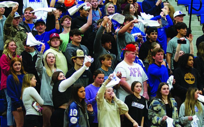 FILE PHOTO The student section will need to be rowdy again tonight when the Badgers and Lady Badgers take on Jarrell in the Badger Den.